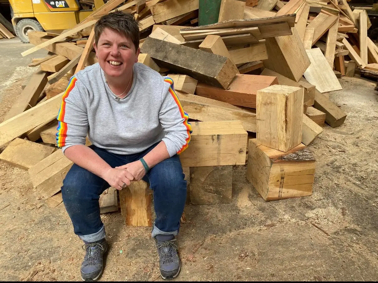 Netty Reddish with timber for the rustic Christmas workshop