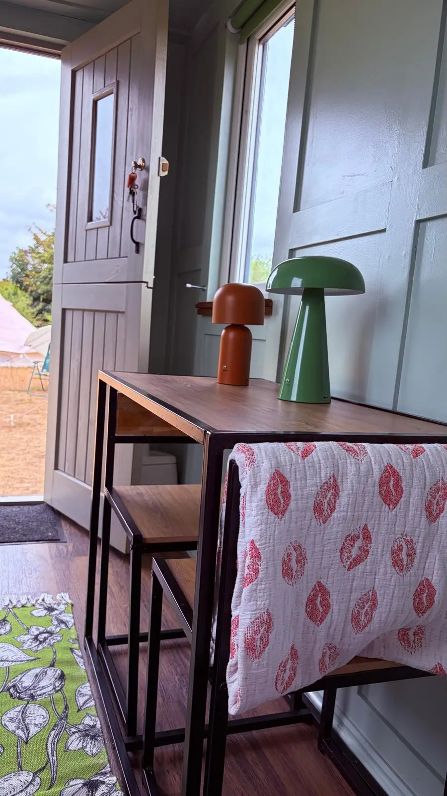Desk and lamps in the small hut